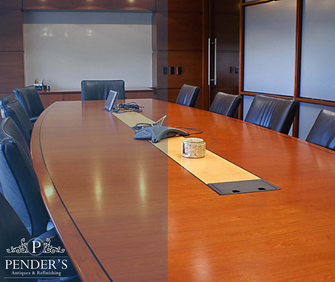 A large wooden conference table in a corporate office setting